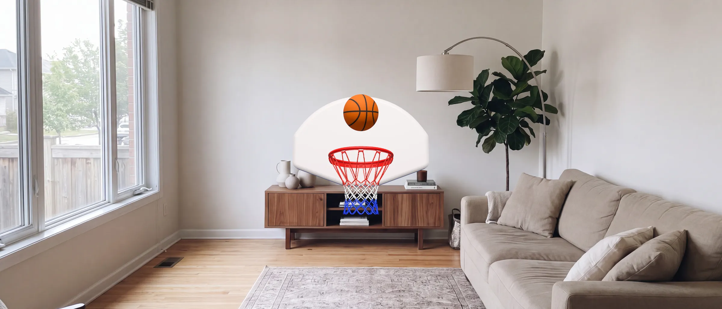 The McHoops hoop in a living room, with a basketball dropping toward it